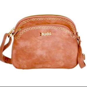 I’m selling a mudd purse color brown small bag slightly used
